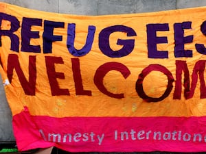 A refugees welcome banner