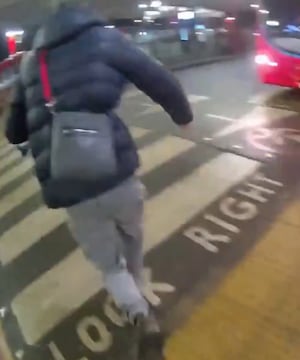 The suspect makes a run for it in Walsall Bus Station