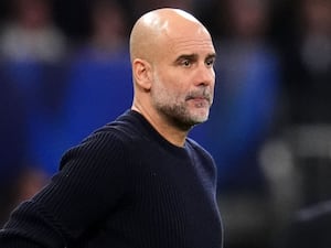 Manchester City manager Pep Guardiola (left) and Real Madrid manager Carlo Ancelotti on the touchline