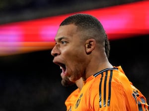 Kylian Mbappe celebrates for Real Madrid