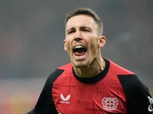 Bayer Leverkusen’s Alex Grimaldo celebrates his winner against Mainz