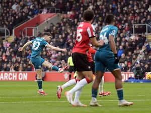 Ryan Christie shoots with his left foot