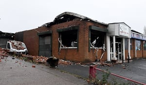 The burned out tackle shop in Hayes Lane, Lye which was on fire last night, with crews battling the blaze overnight,