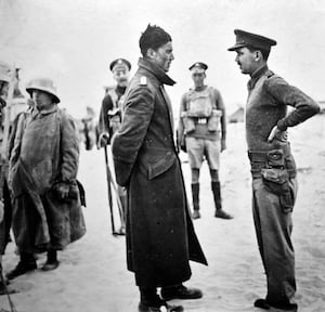 Captain Wilfred Byford-Jones, 'Quaestor' of the Express and Star, interrogating one of the first German officers taken prisoner in Libya