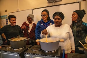 Parents at St Clare’s Catholic Primary School in Handsworth taking part in the healthy eating cookery lesson 