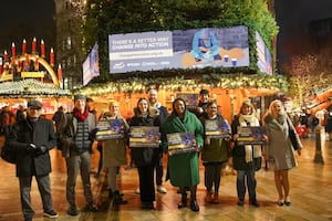 Deputy Mayor of the West Midlands, Cllr Sharon Thompson, centre, are staff and volunteers from local homelessness charities, and representatives on a walkabout of Birmingham Frankfurt Christmas Market to rally support for the Change into Action campaign.