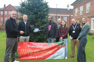 Cardo Central Operations Director Terry Ware and Managing Director Leigh Bullock are pictured presenting the food vouchers to Lichfield District Housing Officer Kuda Chakamba, while Tenancy Sustainment Officer Brian Pugh, Housing Officer Morgan Byrne, Cardo Central Operations Manager Mark Jones and Lichfield District Council’s Project Manager Helen McKenzie look on. 