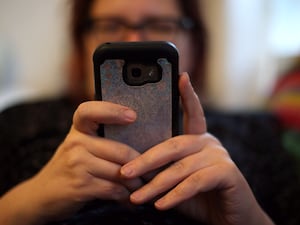 A woman using her mobile phone