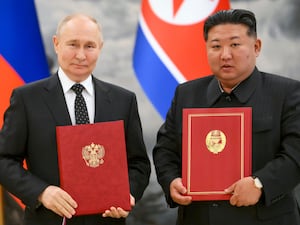 Russian President Vladimir Putin and North Korea’s leader Kim Jong Un pose for a photo