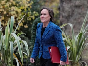 Jo Stevens smiling as she walks up Downing Street