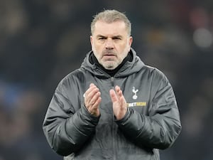 Ange Postecoglou applauds on the touchline