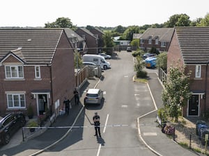 Police activity on Old School Close in the village of Banks, Lancashire