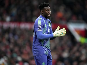 Manchester United goalkeeper Andre Onana claps his hands