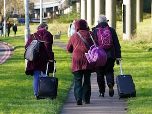 Passengers at Gatwick airport near Crawley, West Sussex