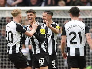 Newcastle United’s Lewis Miley (second left) celebrates scoring