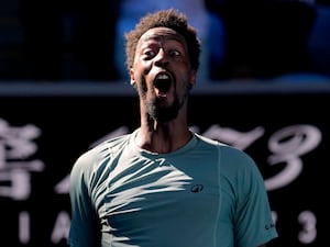 Gael Monfils celebrates beating Taylor Fritz