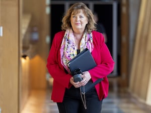 Fiona Hyslop walks to First Minister’s Questions