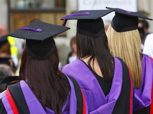 University graduates wearing their caps and gowns