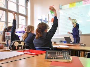 A teacher and students in a classroom