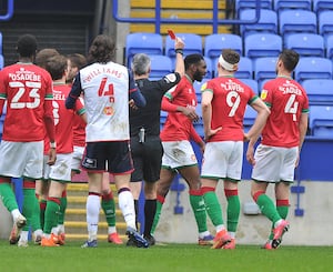 Ex-Walsall defender Hayden White is sent off against Bolton in 2021.
