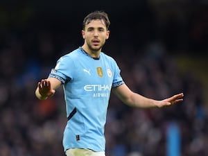 Manchester City’s Nico Gonzalez spreads out his arms during his appearance against Newcastle