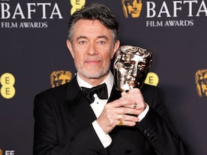 Peter Straughan with his Bafta award for best adapted screenplay