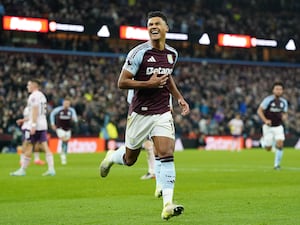 Ollie Watkins celebrates scoring his penalty