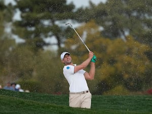 Thomas Detry plays out of a bunker