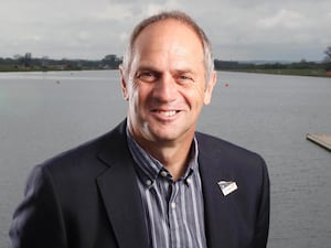 Sir Steve Redgrave standing by water