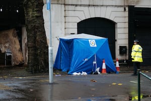 A blue tent in Lichfield Street, Walsall, after a man's body was discovered