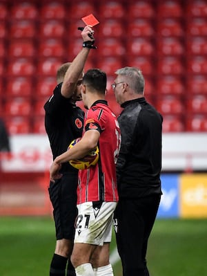 Walsall kit man Dave Joyce is sent off.