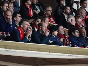 The Prince of Wales watches the Champions League match between Monaco and Aston Villa (Laurent Cipriani/AP)