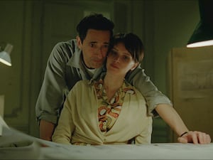 Adrien Brody and Felicity Jones in a scene from The Brutalist