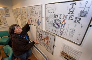 Course leader Clair Harris looks at some of the artwork which will be on display