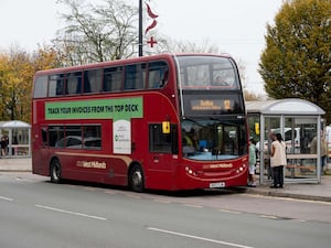 A National Express number 12 bus at Oldbury Interchange, West Midlands