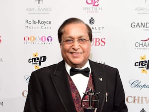 Lord Rami Ranger collecting an award