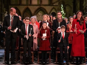 The Prince of Wales, Prince George, Princess Charlotte, Prince Louis and the Princess of Wales during the Together At Christmas carol service at Westminster Abbey in London