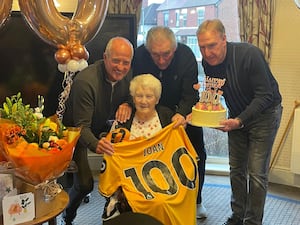 Joan Davies (middle) with Steve Bull (left), Phil Parkes (back) and Steve Daley (right)