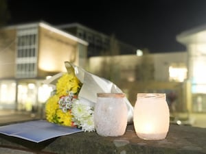 Tributes left outside All Saints Catholic High School, on Granville Road in Sheffield (PA)