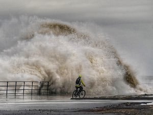 Huge waves crash against the sea wall near Whitley Bay