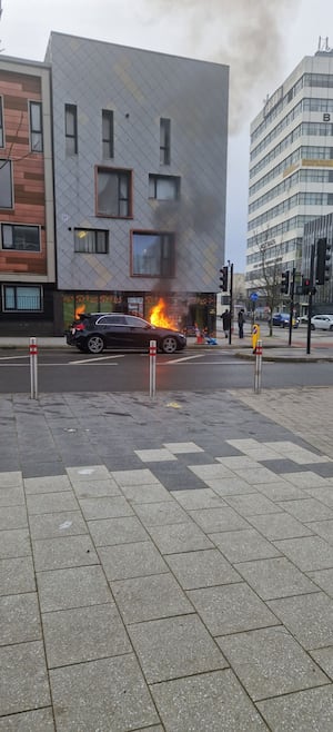 The smoke from the fire could be seen rising above the roofs of the buildings