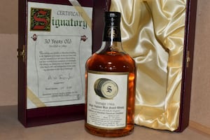 This bottle of Signatory Vintage 1966 Single Highland Malt Whisky Macallan Glenlivet Distillery sold for £1,300 at auction.