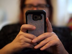 A woman using a mobile phone