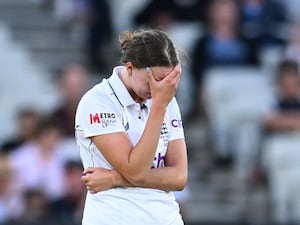 England’s Lauren Filer holds her head in her hand