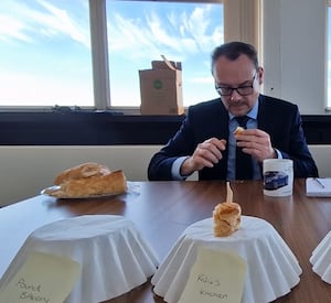 Mark was not very impressed with the 'pinky' coloured sausage inside Pound Bakery's rolls 