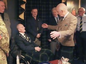 The King meets 99-year-old D-Day veteran Jim Glennie at the Gordon Highlanders Museum in Aberdeen