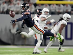 Chicago Bears wide receiver Keenan Allen reaches for an incomplete pass