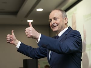 Fianna Fail leader Micheal Martin smiles with his thumbs up at Radisson Hotel, Dublin, during the Fianna Fail ard fheis conference