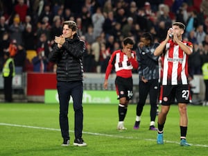 Brentford manager Thomas Frank applauds the fans