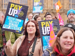 Members of the National Education Union hold a rally in Westminster